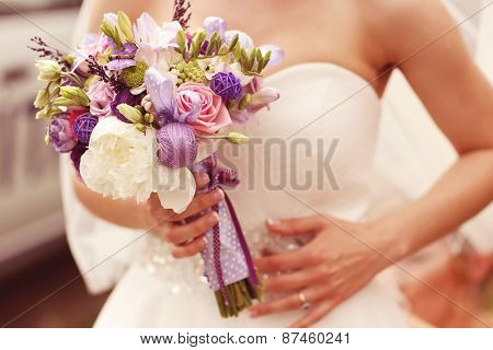 Wedding Bouquet In The Hands Of A Bride