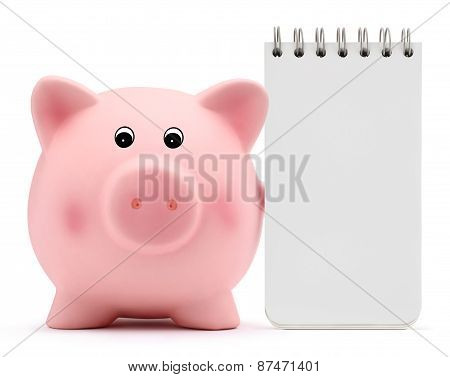piggy bank with block note on white background