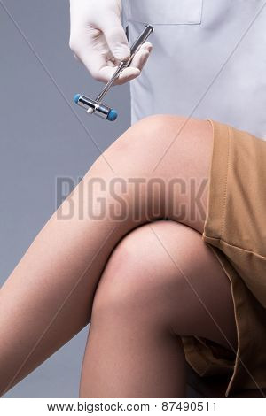 Checking The Knee-jerk Reaction By A Neurological Hammer
