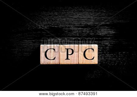 Acronym Cpc - Cost Per Click Isolated On Black Background With Copy Space