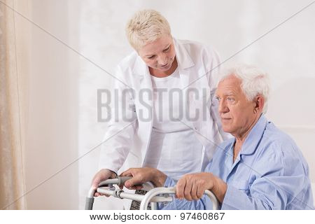 Disabled Patient With Walking Zimmer