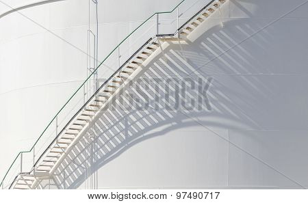 White Tanks In Tank Farm With Iron Staircase