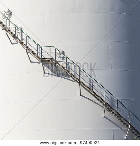 White Tanks In Tank Farm With Iron Staircase