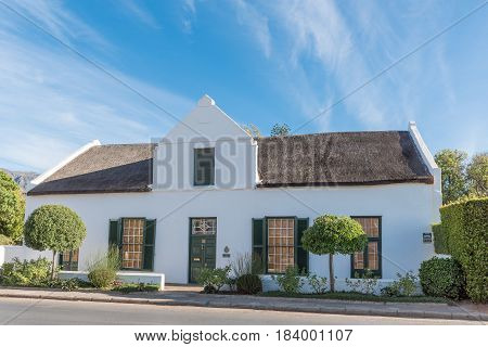 MONTAGU SOUTH AFRICA - MARCH 26 2017: An historic house with thatch roof in Montagu a town in the Western Cape Province