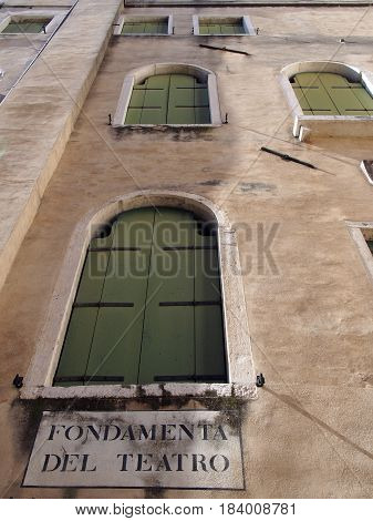 venice italy old windows with green shutters