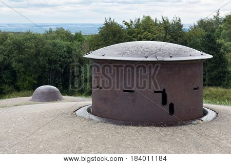 Fort Douaumont near Verdun in France with machine gun turret used in First World War One. It was raised for firing and then lowered for protection.