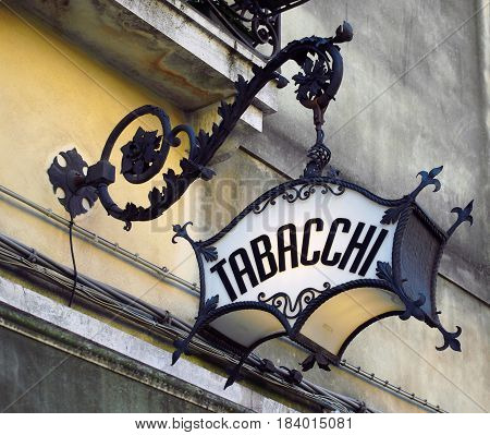 old deco ornate italian tobacconists sign tabacchi = tobacco