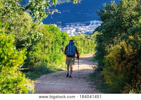 Hiking in famous Lycian Way in the Turkey. Backpacker in the trail.