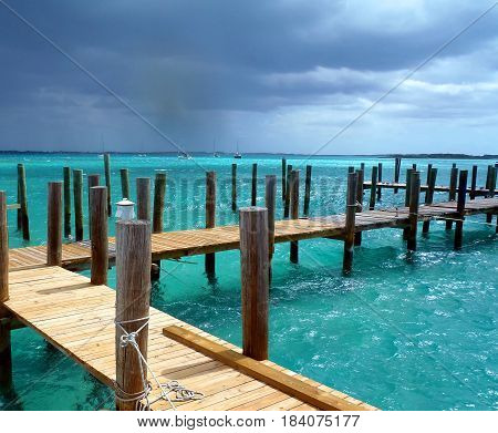 Caribbean rain shower approaching over turquoise sea