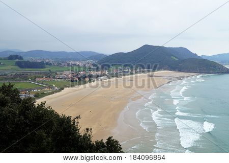 Beach and village of Berria from Mount Buciero, Santoña, Cantabria, Spain