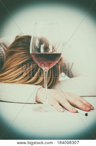 Drunk Woman Sleeping On The Table. Female Alcoholism.