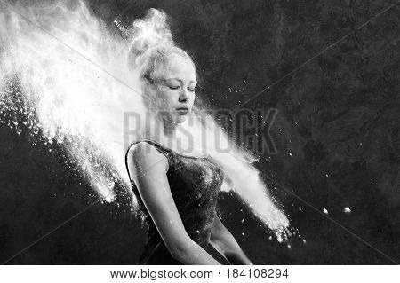 Black and white portrait of young dancer with white flour