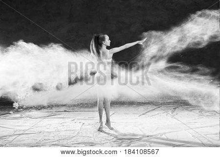 Black and white portrait of young dancer with white flour