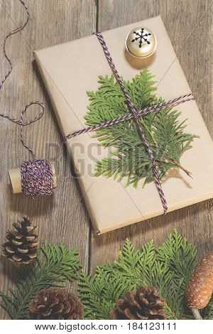 Wrapping Christmas presents with the cypress branches