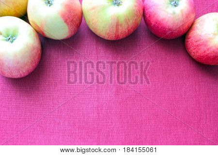 apple red on rose background  agriculture garden harvest taste fresh collection heap disorder