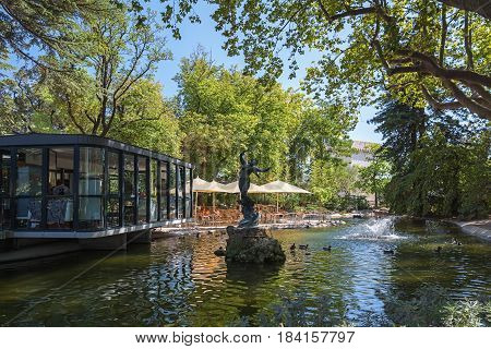 Avignon, France, September 9, 2016: Restaurant in the English-style city park located in the center of the city Avignon on the Rocher des Doms
