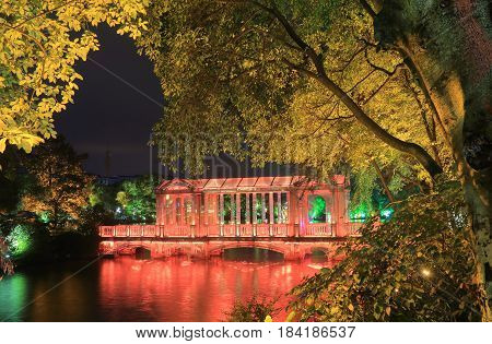 Rough lake night light up cityscape in Guilin China