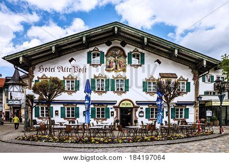 Bavaria, Germany - April 4, 2017: Painting house in village Oberammergau Hotel and cafeteria