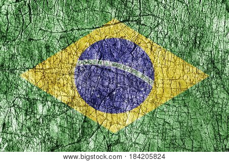 Grudge stone painted Brasil flag background close