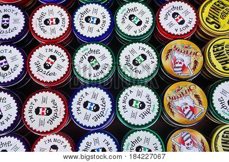 Labuan,Malaysia-Apr 29,2017:Various kind of hair styling gel oil pomade at street market in Labuan,Malaysia.Pomade gives the user's hair a shiny,slick appearance & does not dry it out.