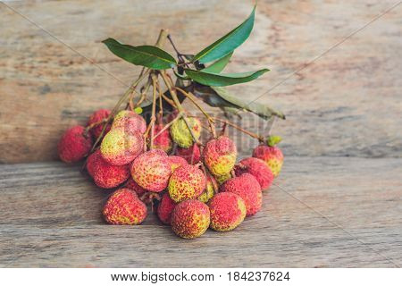 Fresh Litchi Fruit On An Old Wooden Background