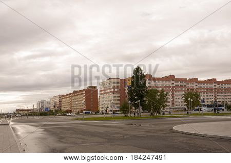 New Urengoy, YaNAO, North of Russia. September 1, 2013. Modern business offices on the 26th Congress of the CPSU street