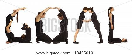 Black dressed people forming word GOAL on white background