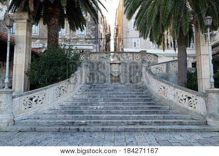 KORCULA, CROATIA - NOVEMBER 09: Stairs entrance to the old medieval town of Korcula, Dalmatia, Croatia on November 09, 2016.