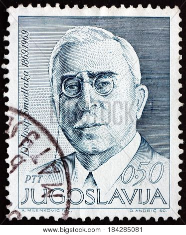 YUGOSLAVIA - CIRCA 1969: a stamp printed in Yugoslavia shows Josip Smodlaka Politician and Journalist circa 1969