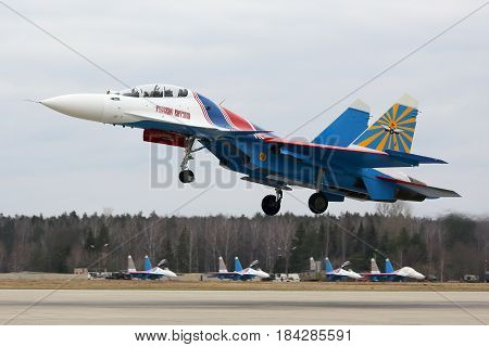 KUBINKA, MOSCOW REGION, RUSSIA - APRIL 10, 2017: Sukoi Su-30SM 32 BLUE of Russian Knights aerobatics team of Russian air force during Victory Day parade rehearsal at Kubinka air force base.