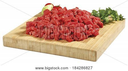 fresh raw red cubed meat chunk on wooden cut board isolated over white background