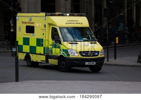 LONDON UK - 25 APRIL 2017: Ambulance in motion on the street in London