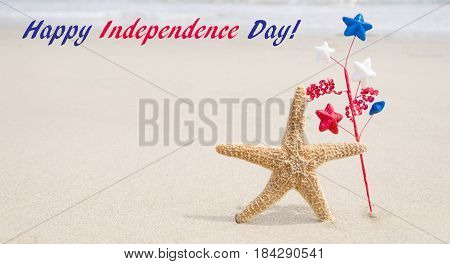 Independence Day USA background with starish on the sandy beach near the ocean/ American Patriotic comcept