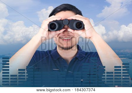 Double exposure of Asian investor with binoculars. Over seascape view from aerial and financial graph on blurred building background import export concept Elements of this image furnished by NASA.