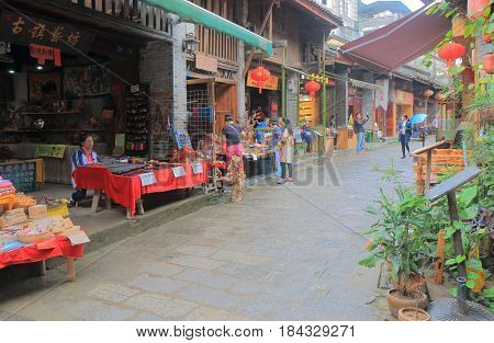 YANGSHOU CHINA - NOVEMBER 19, 2016: Unidentified people visit Xingping historical village. Xingping is a historical fishing village near Li river.