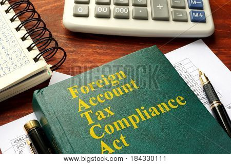 FATCA  Foreign Account Tax Compliance Act on a table.