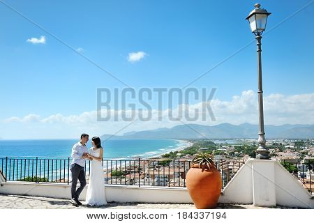 Tender couple bride and groom in wedding day in Sperlonga Itay Europe