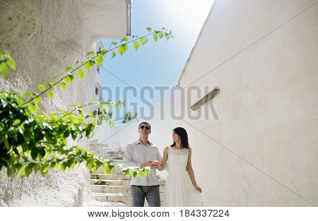 Happy couple bride and groom in honeymoon in Sperlonga Italy Europe