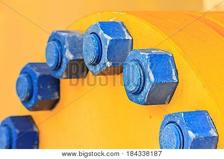 Stud bolt blue and Nuts on vessel for sea offshore wellhead remote platform Oil and GasEnergy and petroleum industry.