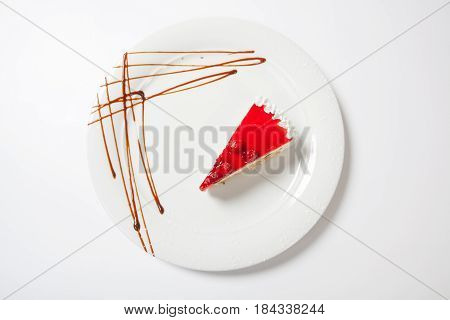 Dessert - Cheesecake With Berries Sauce On White Plate