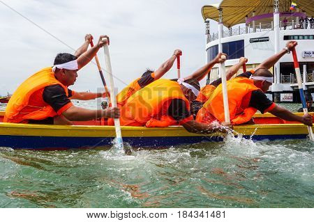 Labuan,Malaysia-April 29,2017:Group of boatman with life jacket participate in a boat tug of war games in Labuan International Sea Sports Complex at Labuan,Malaysia on 29th April 2017.
