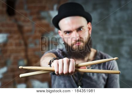 The Man With The Drumsticks
