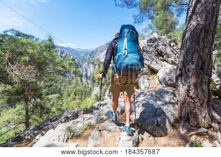 Hiking in famous Lycian Way in the Turkey. Backpacker in the trail.
