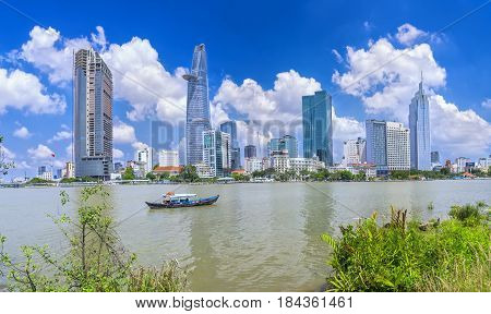 Ho Chi Minh City, Vietnam - May 1st, 2017:  Skyscrapers along river with architecture office towers, hotels, center cultural and commercial development country most in Ho Chi Minh city, Vietnam