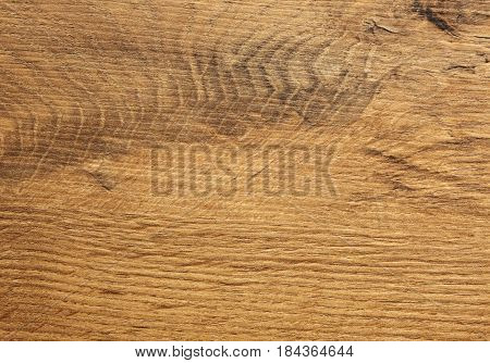 Old wooden plate with visible jars and scratches.Intractive background and texture.Horizontal view.
