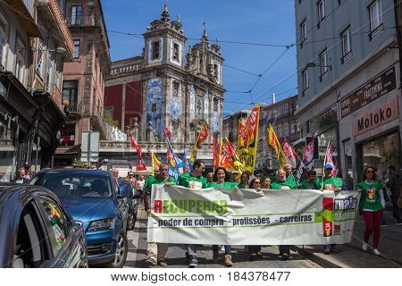 PORTO, PORTUGAL - MAY 1, 2017: During celebration of May Day in the city centre. General Confederation of Portuguese workers, traditionally associated with the Communist party, has 800.000 members.