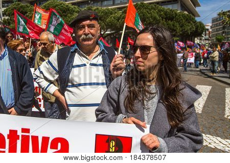 PORTO, PORTUGAL - MAY 1, 2017: During celebration of May Day in the city centre. General Confederation of Portuguese workers, traditionally associated with the Communist party, has 800.000 members.