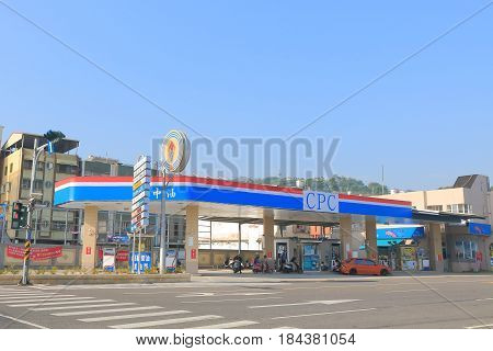 KAOHSIUNG TAIWAN - DECEMBER 13, 2016: Unidentified people buy petrol at CPC petrol station. CPC is a state-owned petroleum, natural gas, and gasoline company in Taiwan.