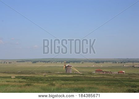 landscape with a windmill in the reserve Arkaim Russia