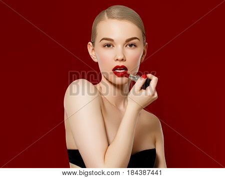 Fashion Photo. Closeup Of Woman Face With Bright Red Matte Lipstick On Full Lips. Beauty Cosmetics,
